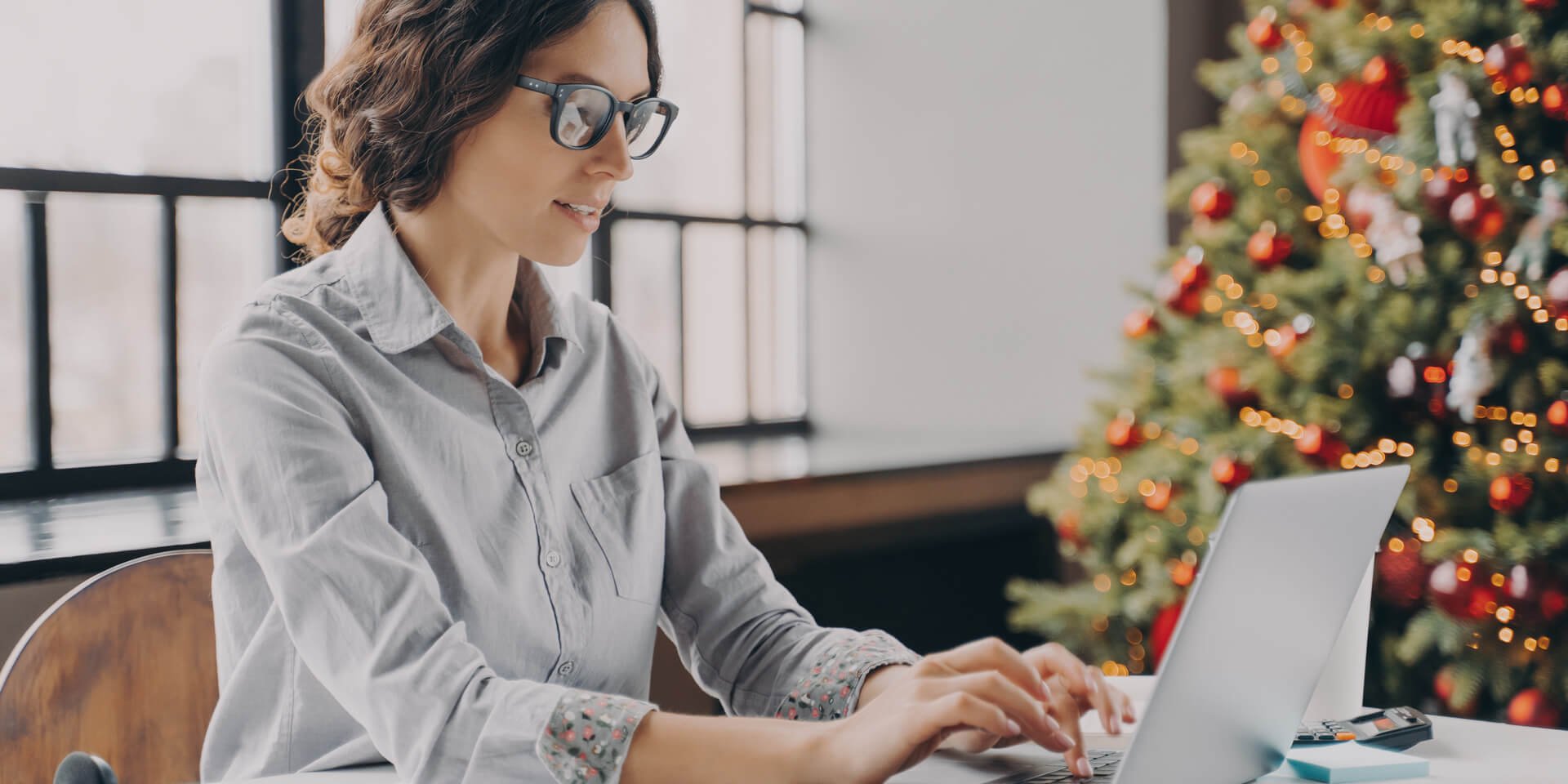 businesswoman-wearing-glasses-sitting-in-office-ne-2023-11-27-05-30-43-utc (1)